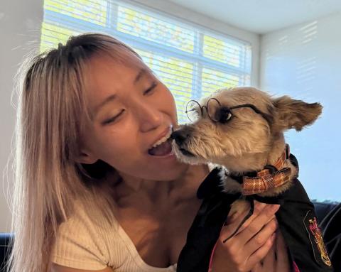 CWRU nursing student Hannah Price with her dog, Neville, dressed as a Harry Potter character