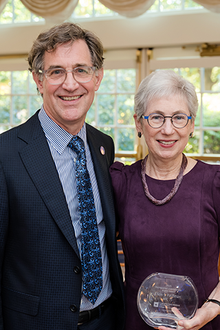 Ellen Feldman posing with her Distinguished Undergraduate Alumni Award