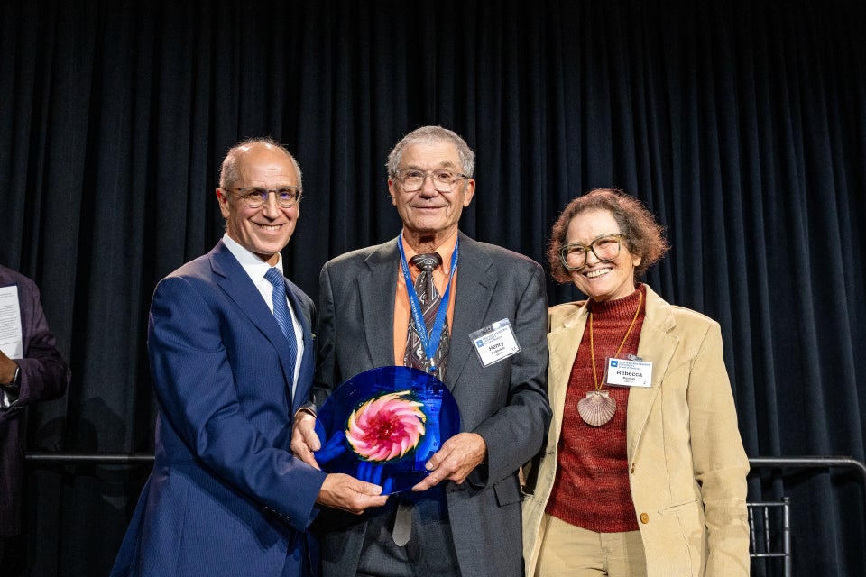 Buckholder accepting award from Dean Gerson
