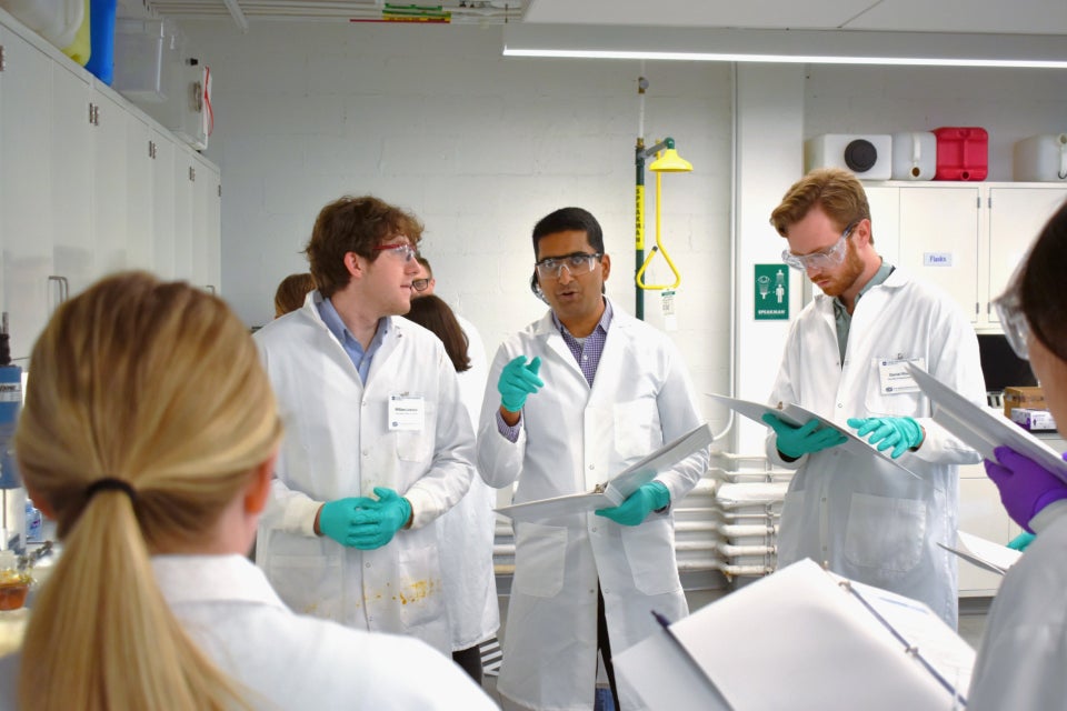 Participants having a discussions during an electrochemical engineering workshop