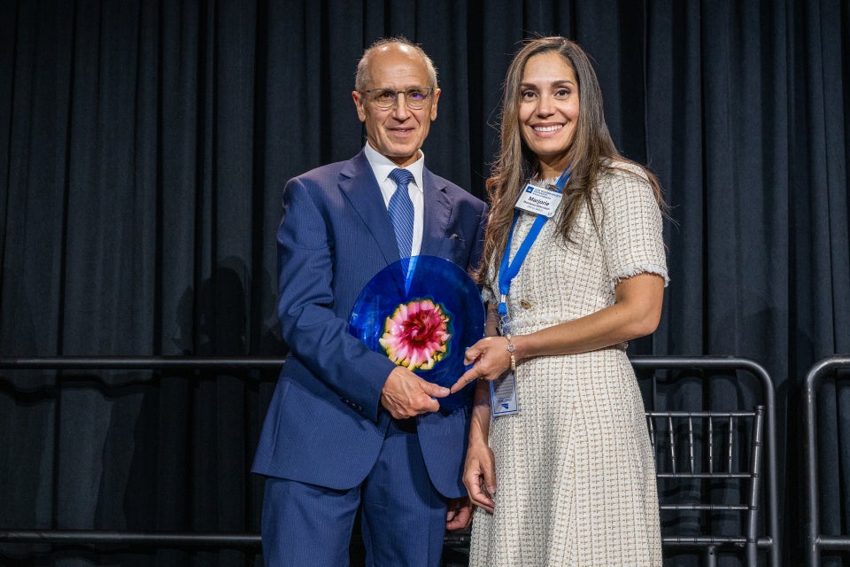 Montanez-Wiscovich accepting award from Dean Gerson