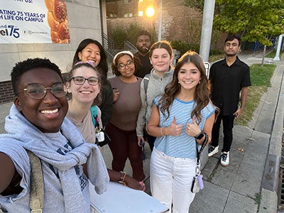 Photo of several students gathered for a selfie