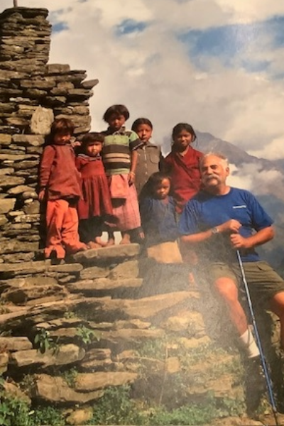 Elliot Siegel in the mountains with young children 