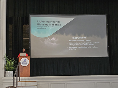 Photo of Blessing Masanga presenting at the Just a S.E.C. event