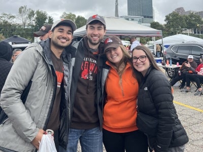 Jacunski and friends attend a Cleveland Browns football game. 