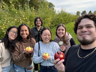Henry Herrera apple picking with friends