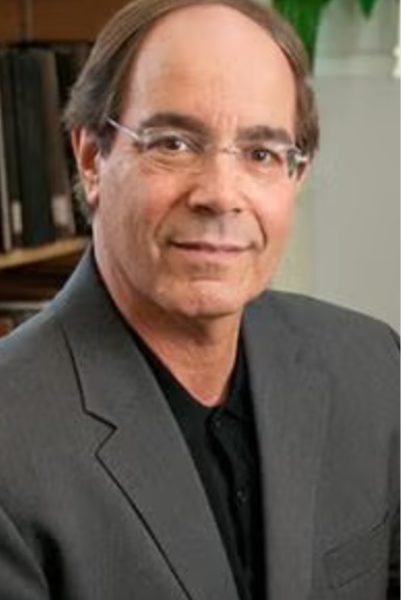Mark Singer in a grey blazer