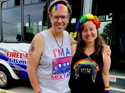 Jason Steckel and his wife, Martha Nieset, attend a pride event. 