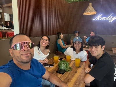 Dalerys Feliciano Acevedo with family in Puerto Rico