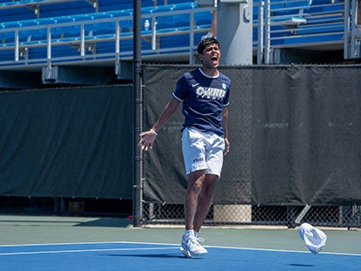 Ansh Shah jumps in excitement on the tennis court