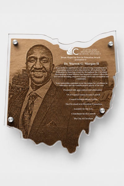 Photo of a laser-engraved award plaque Mike Crawford made for Warren Morgan