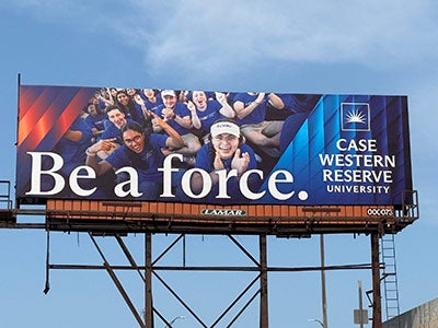 Photo of the CWRU billboard that says "Be a force" along the Shoreway