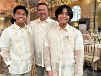  JP Flores (left) celebrates with family at a wedding in the Philippines, wearing a barong (a traditional Filipino garment). 