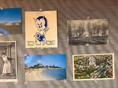 postcards on a bulletin board