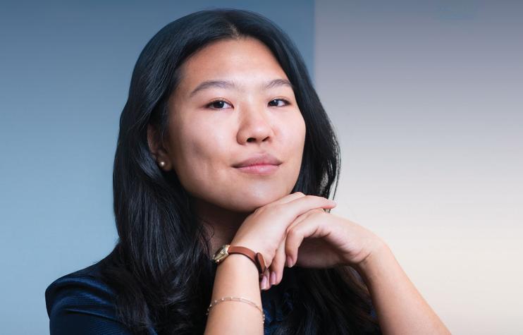 Logan Tsukiyama posed with her chin on her hands