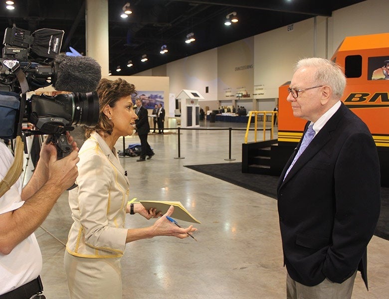 Susie Gharib interviewing Warren Buffett