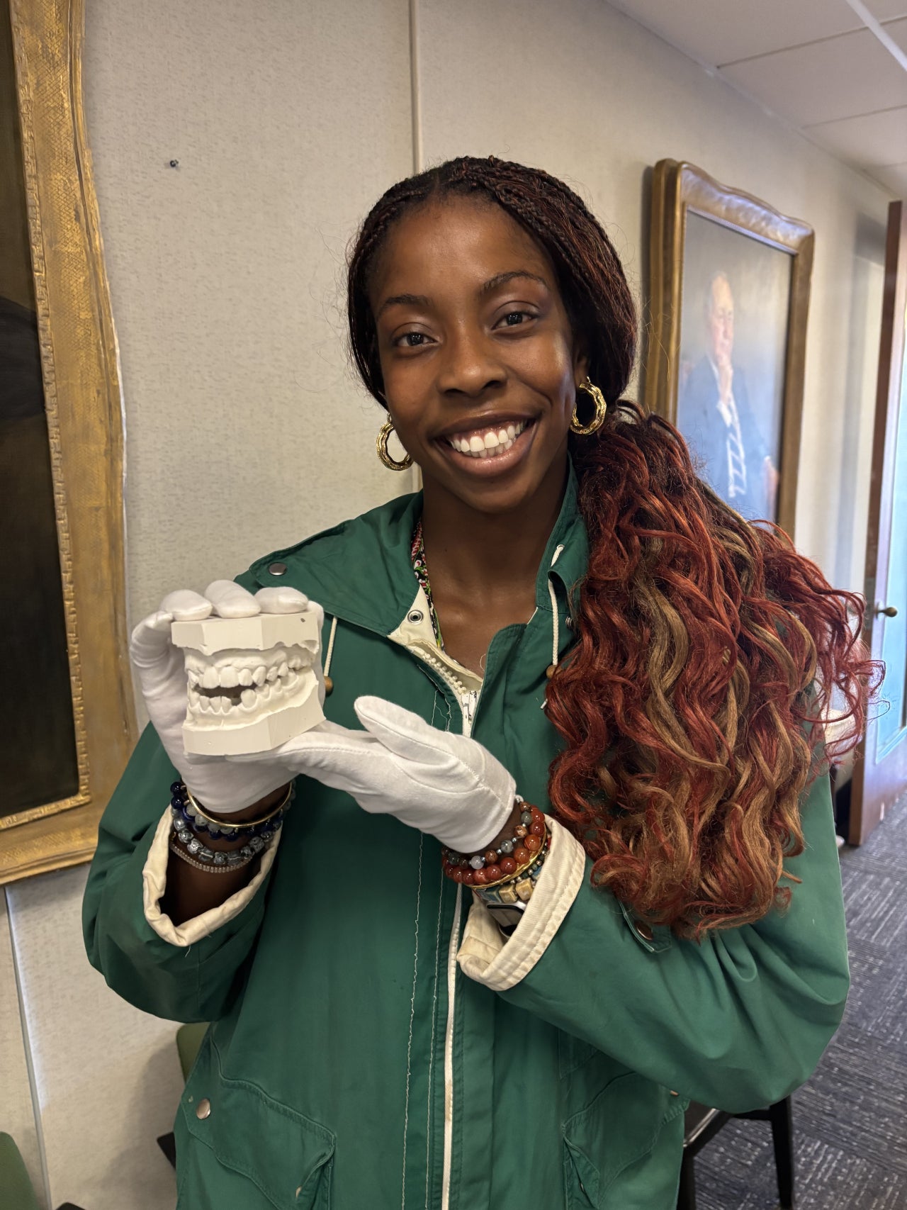Student holding dental cast from Richardson Collection