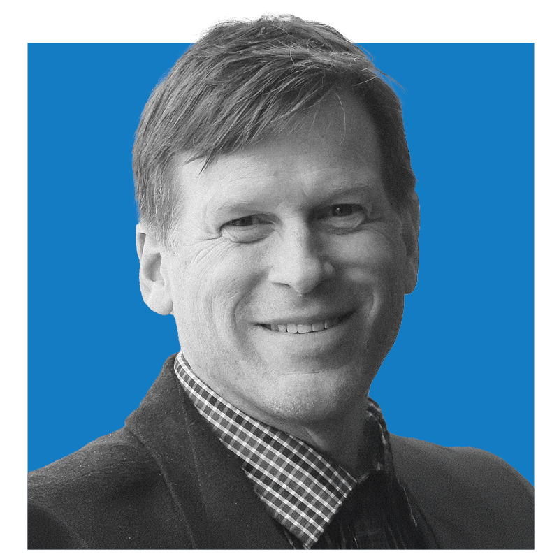 Black and white head-and-shoulders photographic portrait of Timothy Beal.