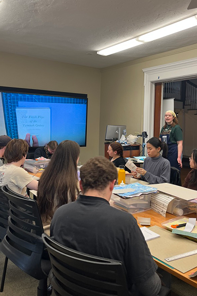 Paige Erickson (CWR ’26) instructs students during a lab session in Bellflower Hall