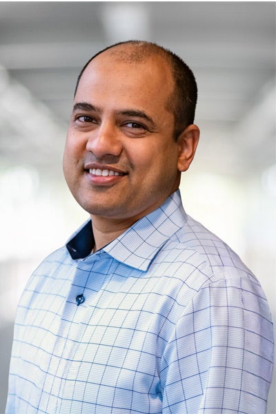 A headshot of Abhinav Acharya.