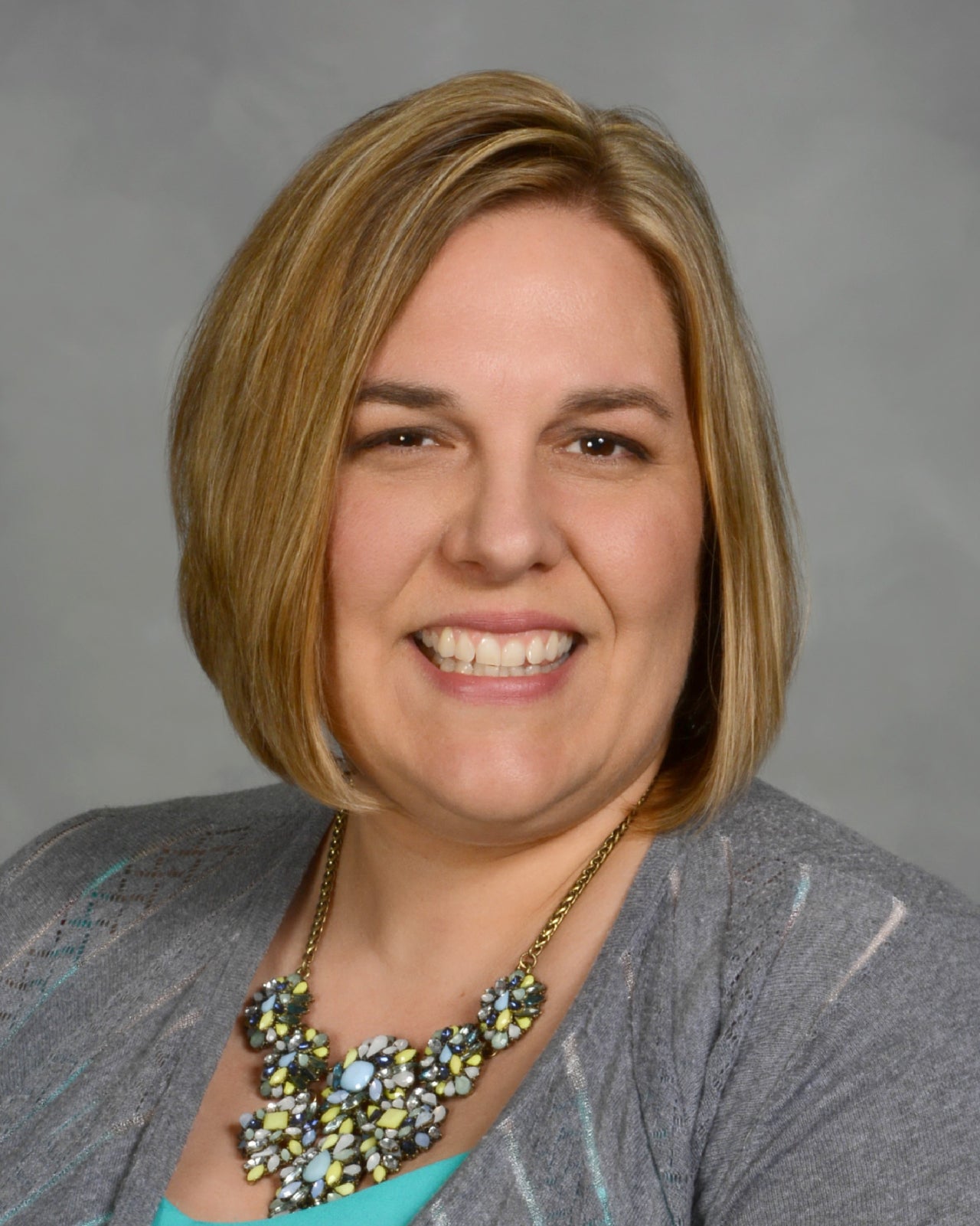 Woman with short blond hair 