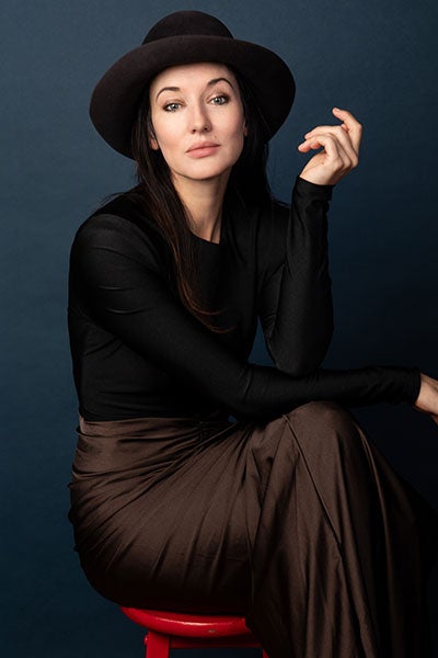 Elizabeth A. Davis headshot with a hat on