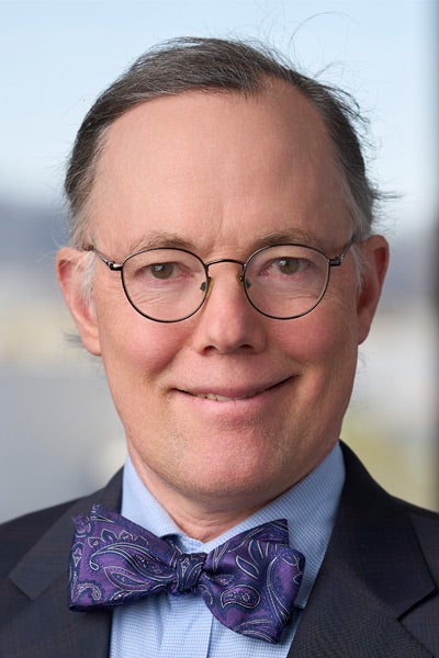 A headshot of Peter Thomas