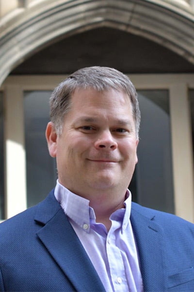 A headshot of Gregory Tochtrop