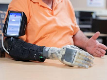 Photo showing a man using an advanced prosthesis