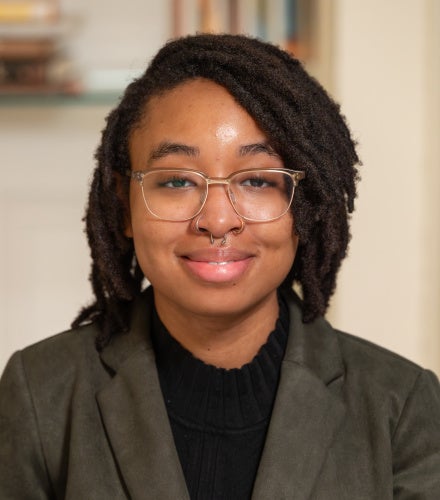 Headshot of LaNaya Terry wearing a gray jacket and black shirt