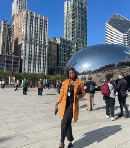 Angela Ugoji in front of the Bean in Chicago