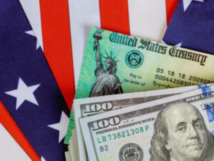 U.S. money with U.S. flag