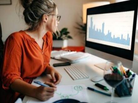 Woman working at a computer
