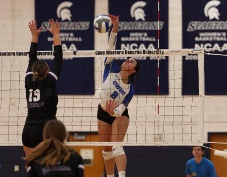 Kalli Wall playing volleyball.