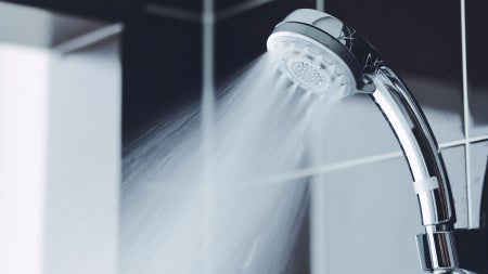 Photo of water spraying from a shower head