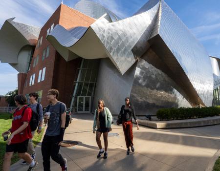 Photo of students walking in front of the Peter B. Lewis Building at CWRU