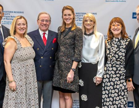 Case Western Reserve University donors, professors and administrators pose at an event for the nursing school