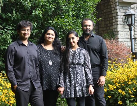 A family poses for a group photo