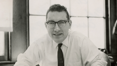 Eli Reshotko sitting at a desk