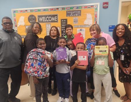 Staff members of Project STEP-UP partner with the CWRU Staff Advisory Council to donate supplies to students of Daniel E. Morgan School. 