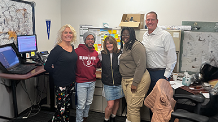 CPFM customer service staff with vice president Dean Tufts
