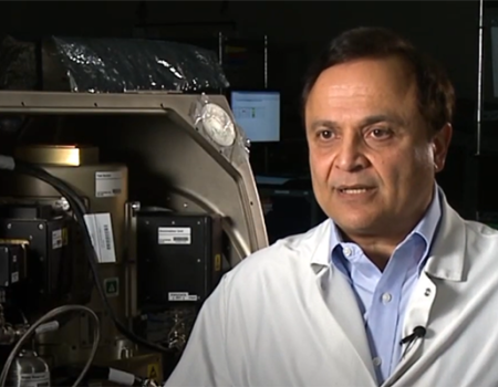 Mohammad Kassemi standing in the ZBOT Lab