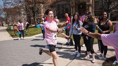 Students running in the Hudson Relays