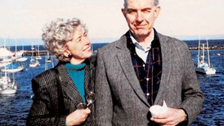Ann and Dr. James Swinehart standing in front of the water