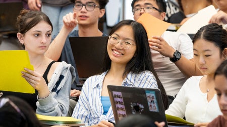 Photo of a student smiling in a classroom at CWRU