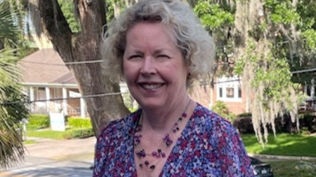Linda Leatherbury standing outside on beautiful sunny day