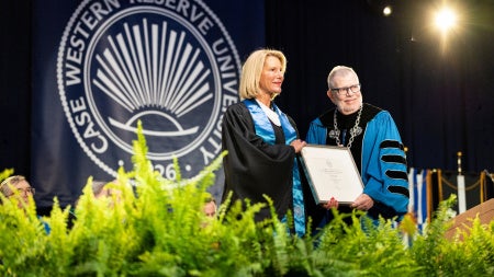 Ellen Mavec (pictured left) receives CWRU's President's Award for Visionary Achievement from President Eric W. Kaler.