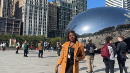 Angela Ugoji in front of the Bean in Chicago