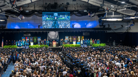 Aerial view of the stage and audience at the undergraduate commencement ceremony