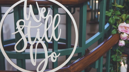 "We still do" sign from the vow renewal event